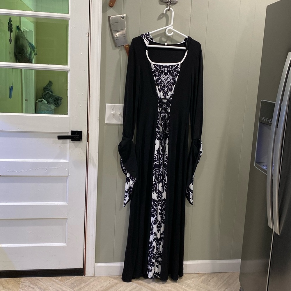 Black and white dress with hood.